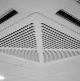 Close-up of a four-way ceiling diffuser at Quixel, Blue Area