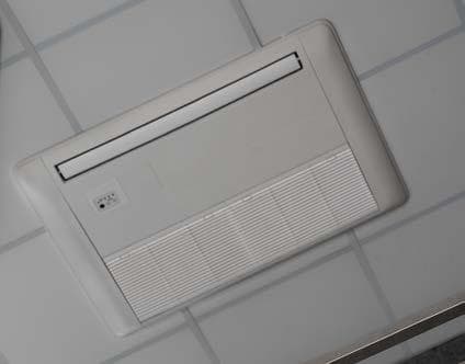 Ceiling-mounted indoor unit set into a tiled ceiling at Mall of Gulberg