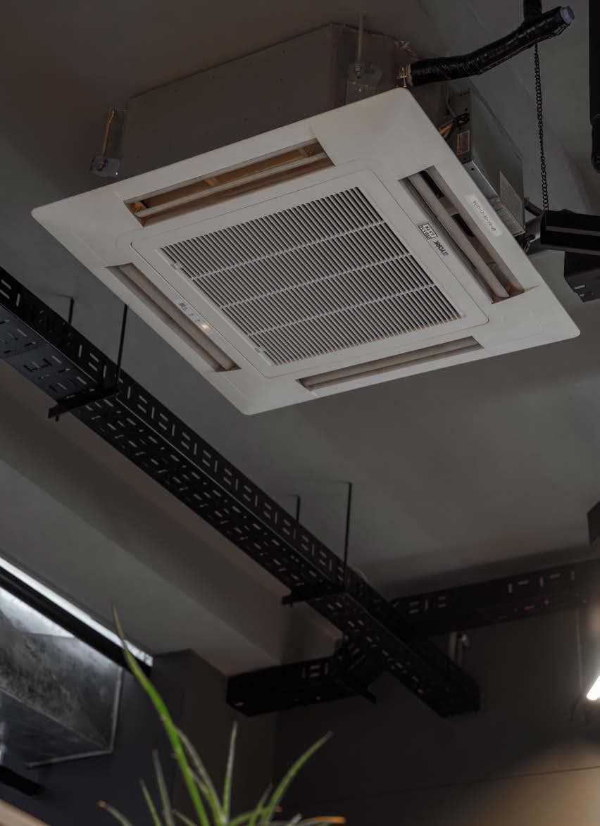 Close-up of York 4-way ceiling cassette air conditioning unit at Quixel
