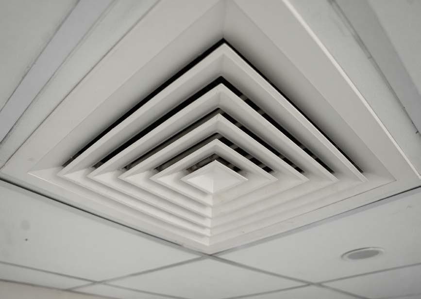 4-way supply air diffuser flush mounted in modular ceiling tile