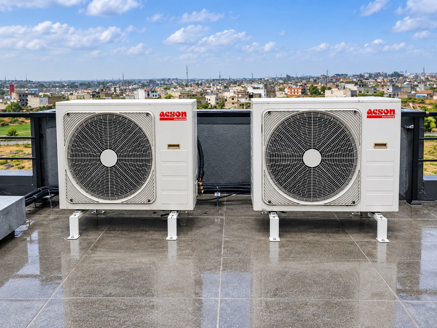 Pair of split outdoor units on a rooftop at the National Police Academy, Islamabad