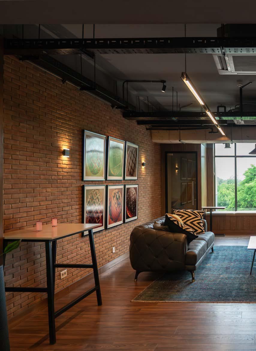Executive lounge interior with ceiling climate control at Quixel Islamabad